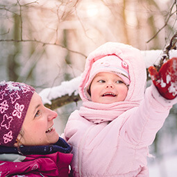 mum and daughter playing winter snow kid baby fun family moments forest pink smile UGC content